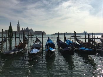 View of boats moored in water