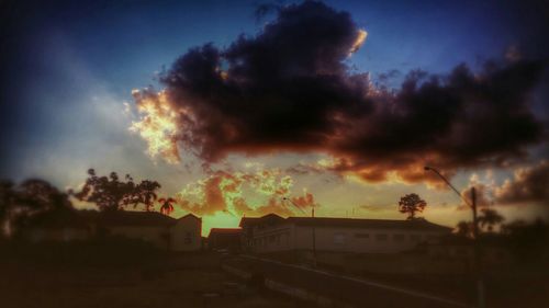 Low angle view of cloudy sky at sunset