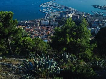 High angle view of town by sea