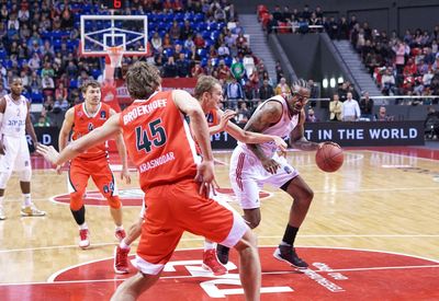 Group of people on basketball court