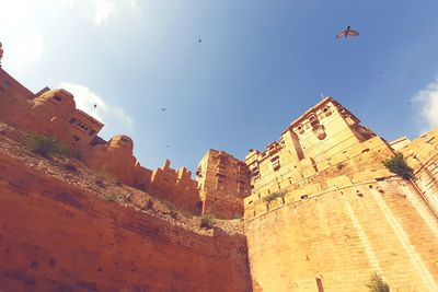 Low angle view of fort against sky