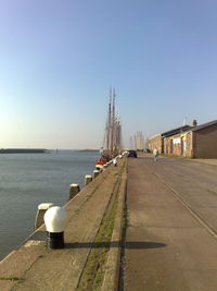 Panoramic view of harbor against clear sky