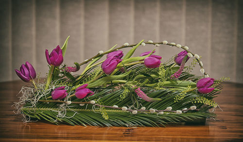 Close-up of purple flowers on table