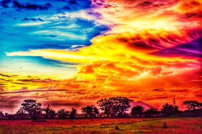 Scenic view of dramatic sky during sunset