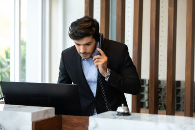 Young man using mobile phone