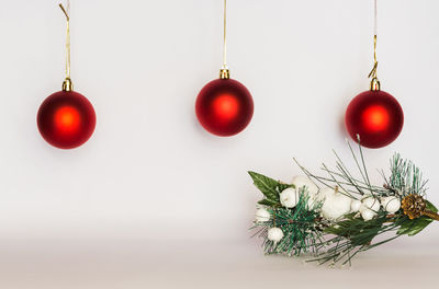 Close-up of christmas decorations hanging on tree