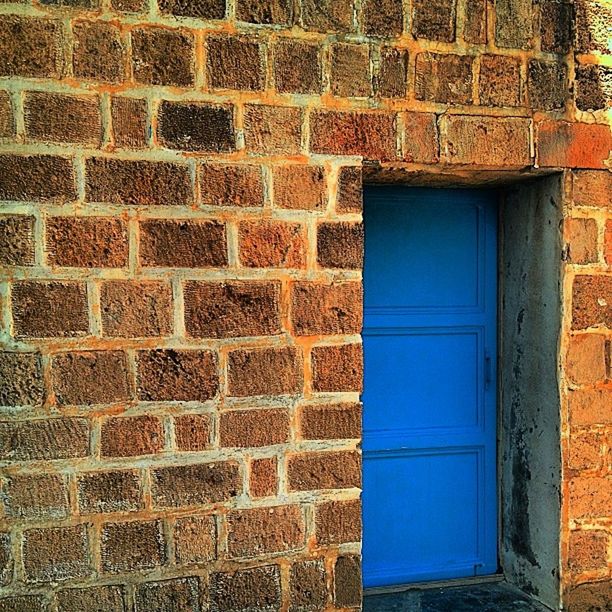architecture, building exterior, built structure, brick wall, window, wall - building feature, pattern, wall, closed, house, door, blue, outdoors, day, no people, close-up, stone wall, brick, full frame, old