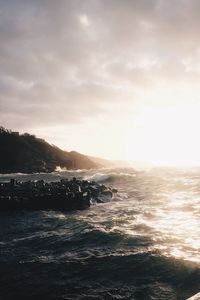 Scenic view of sea at sunset