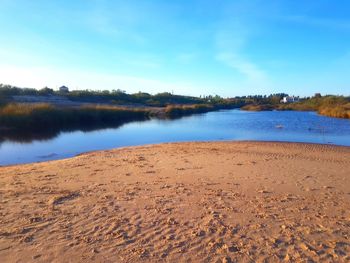 Scenic view of lake against sky