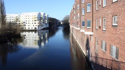 View of canal in city