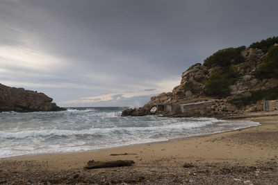 Scenic view of beach against sky