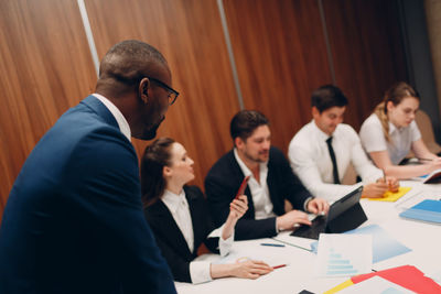 Business colleagues having discussion at office