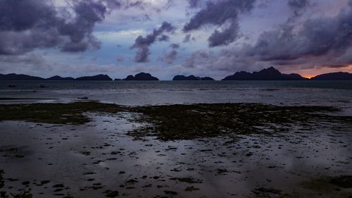 Scenic view of sea against sky at sunset