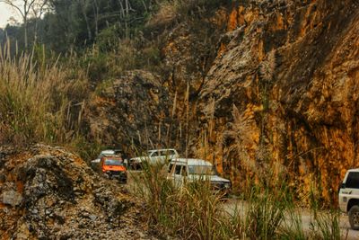 View of cars moving on the road