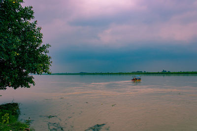 Scenic view of river against sky