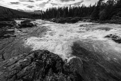 Surface level of stream against sky