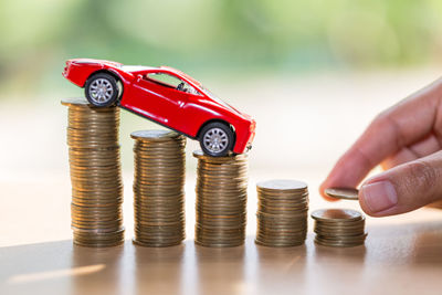 Saving money for car that stack gold coin growing ,saving money or money growth concept.