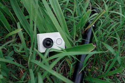 High angle view of camera on grass