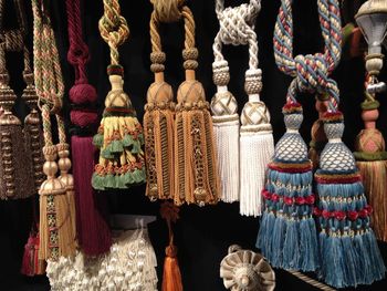 Clothes hanging at market stall