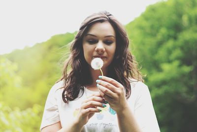 Portrait of woman eating food