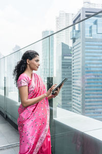 Young woman using mobile phone