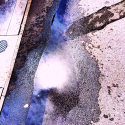 Rain drops on water surface