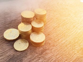 High angle view of coins on table