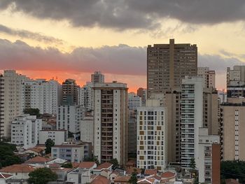 High angle view of buildings against sky during sunset