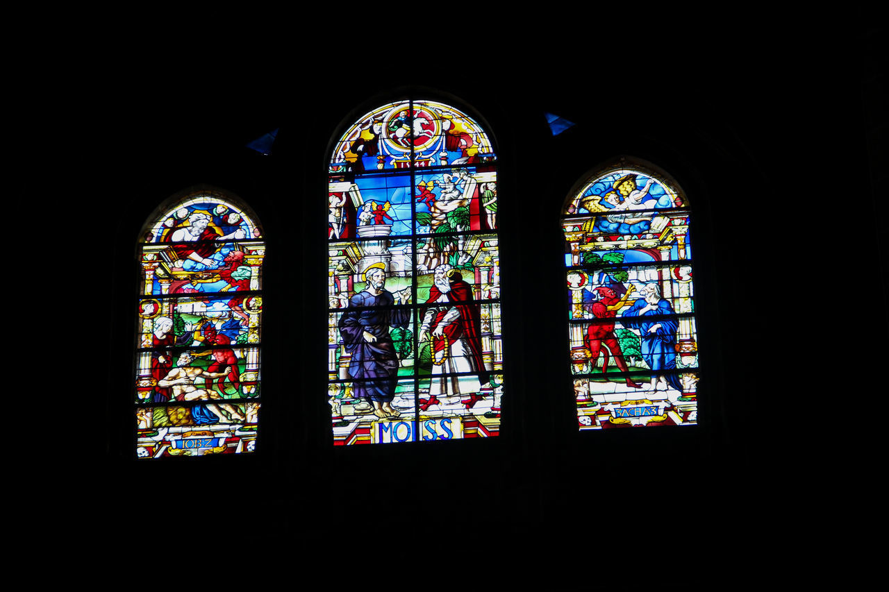 VIEW OF MULTI COLORED WINDOW IN TEMPLE