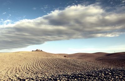 Scenic view of desert against sky