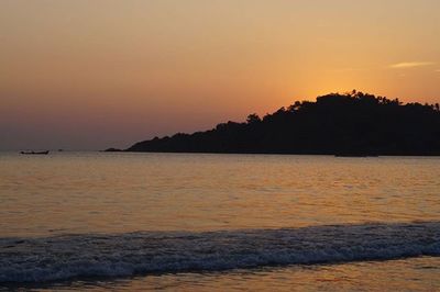 Scenic view of sea at sunset