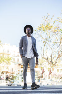 Full length of man standing in city