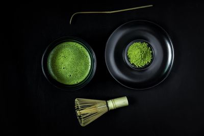 High angle view of drink against black background