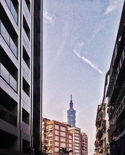 Low angle view of skyscrapers against sky