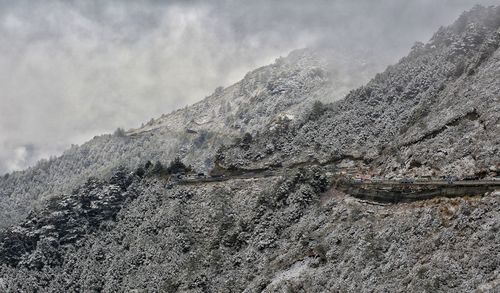 Scenic view of snowcapped mountain against sky