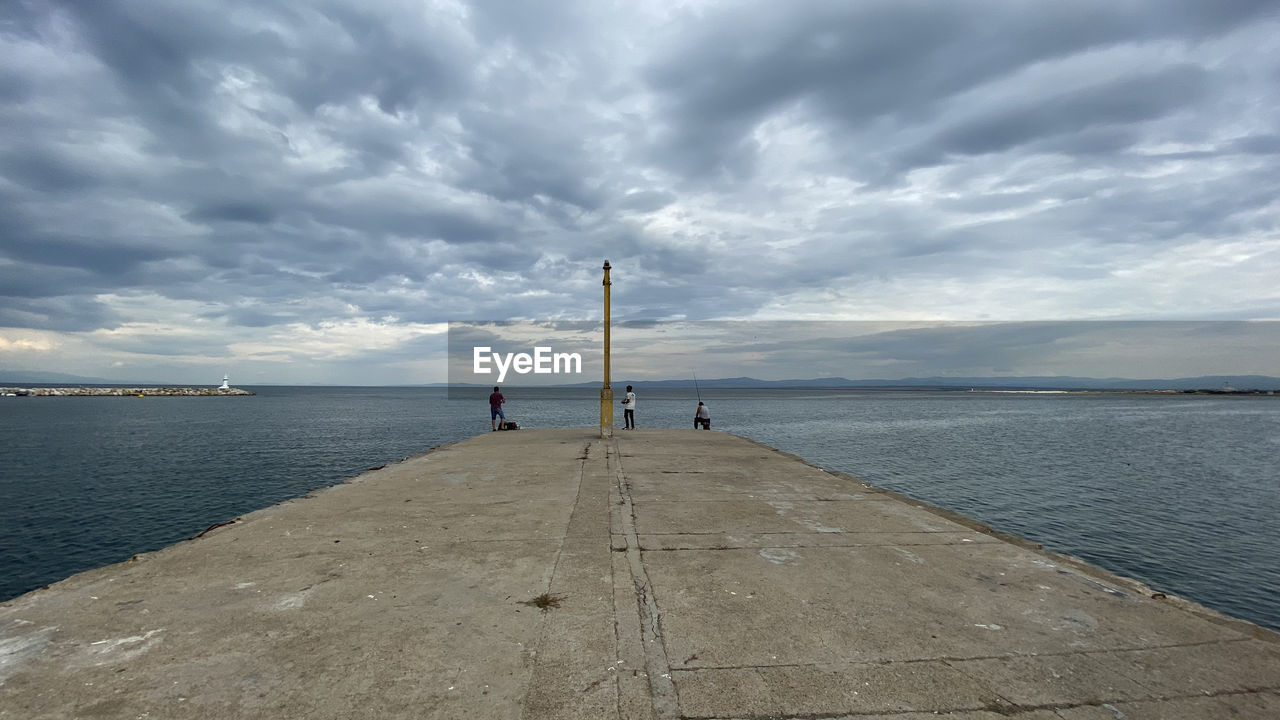 SCENIC VIEW OF PIER OVER SEA AGAINST SKY