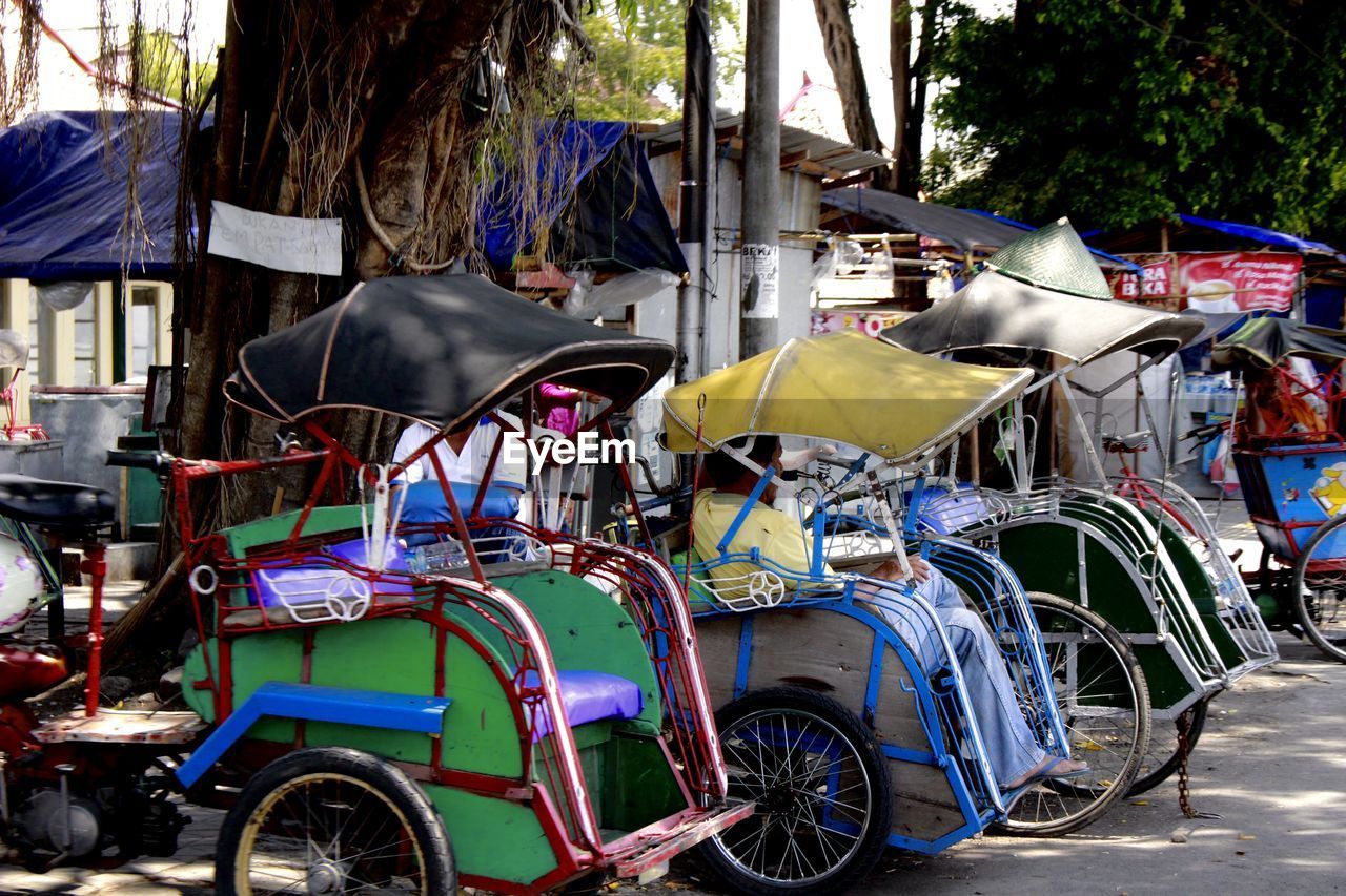 BICYCLES PARKED ON ROAD