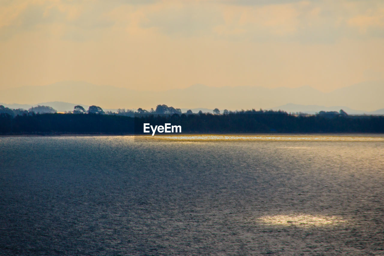 VIEW OF SEA AGAINST SKY DURING SUNSET