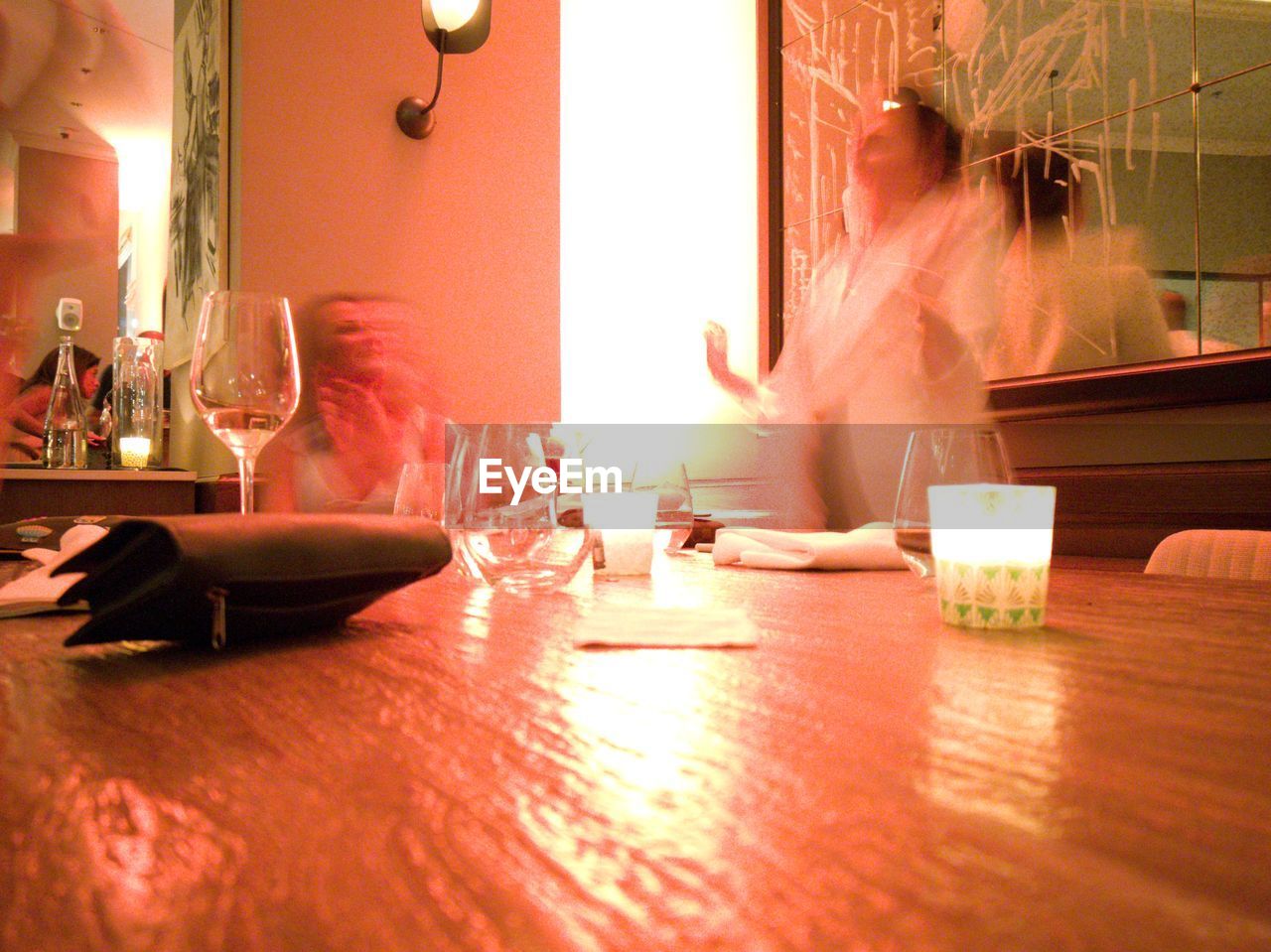 Long exposure image of people in restaurant