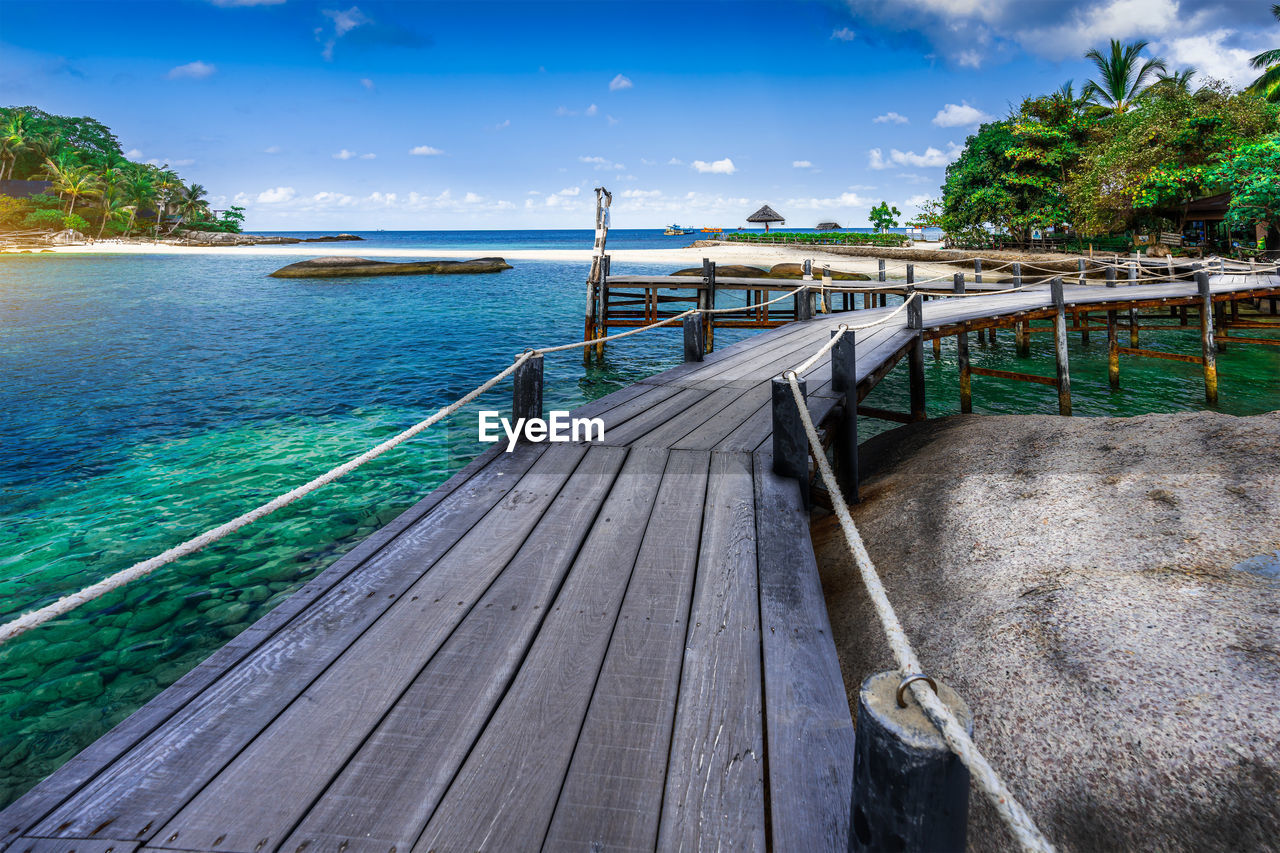 Wooden bridge to the island of koh nang yuan, surat thani, thailand