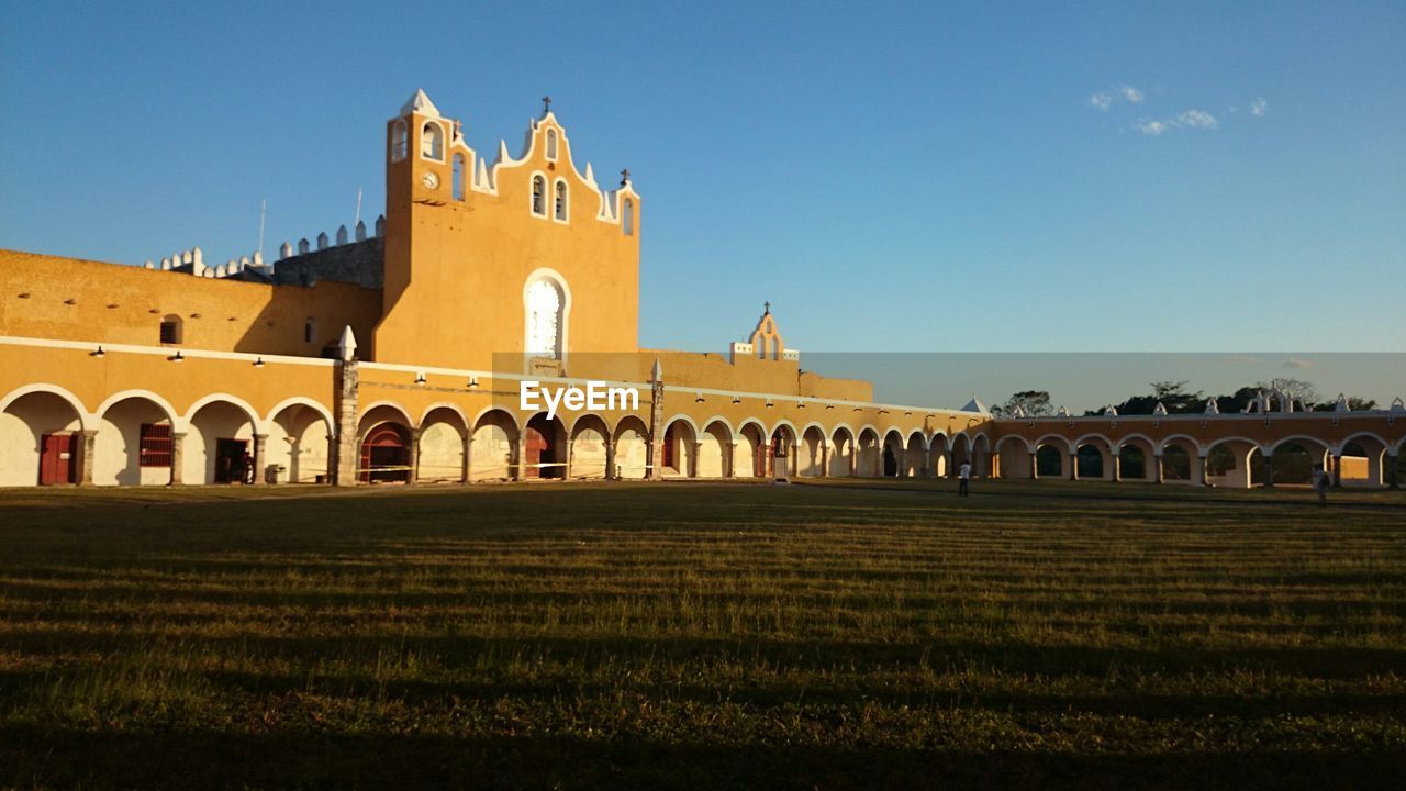 Low angle view of church against blue sky