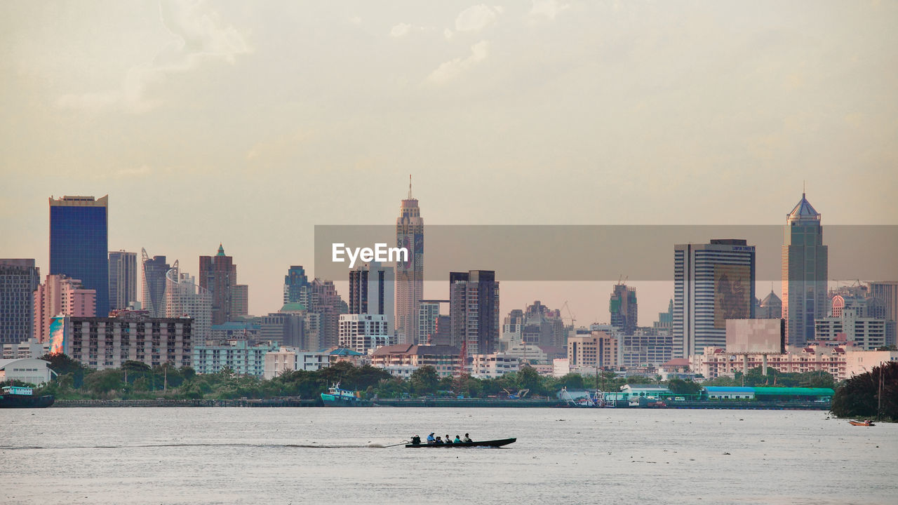 View of buildings in city at waterfront