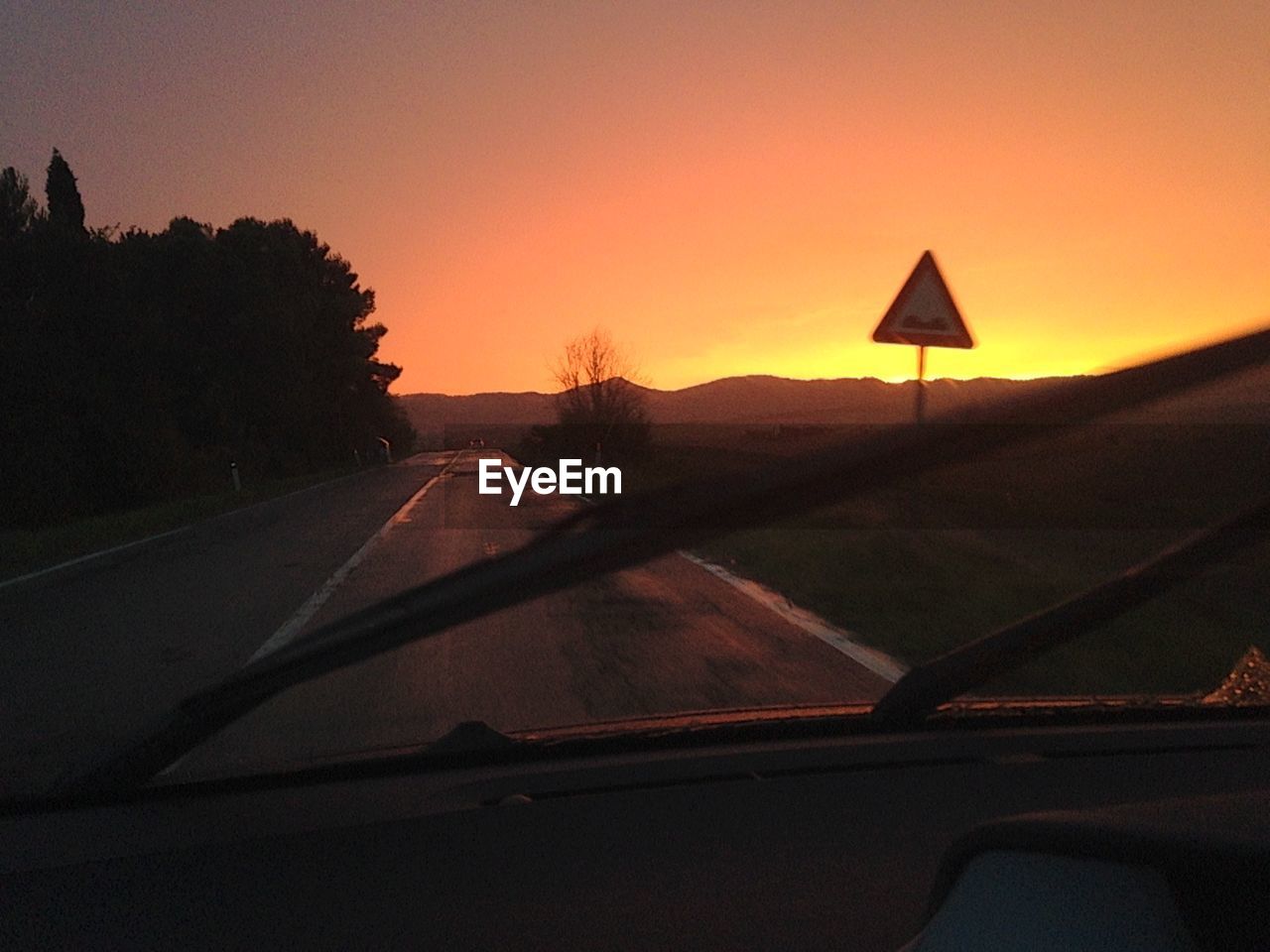 ROAD PASSING THROUGH LANDSCAPE