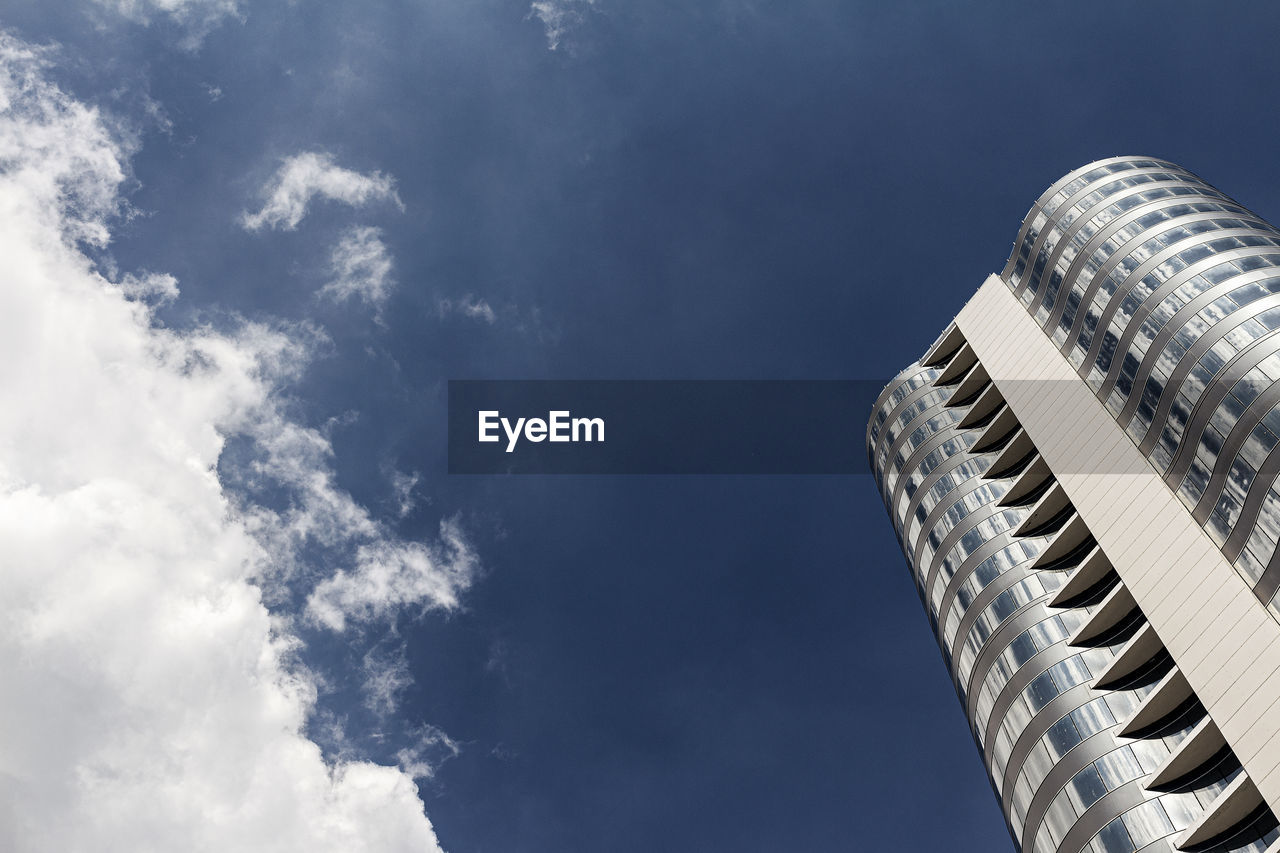 Low angle view of modern building against sky