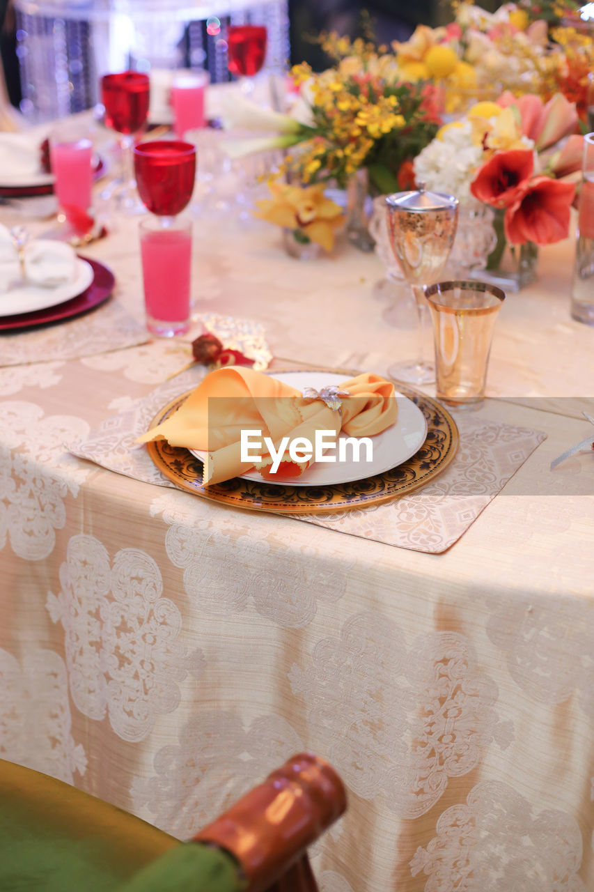 High angle view of wine glass on table