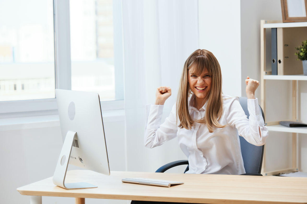 portrait of smiling female doctor examining patient at office