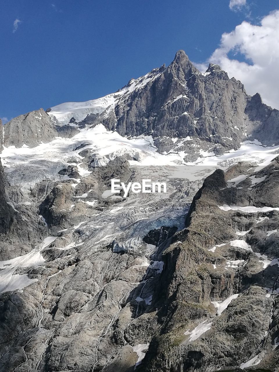 Scenic view of mountains against sky during winter