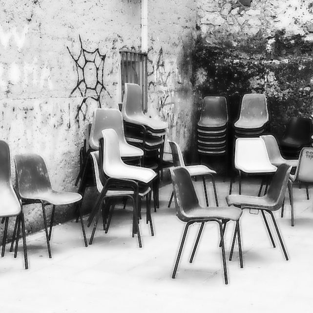 EMPTY CHAIRS IN A ROW