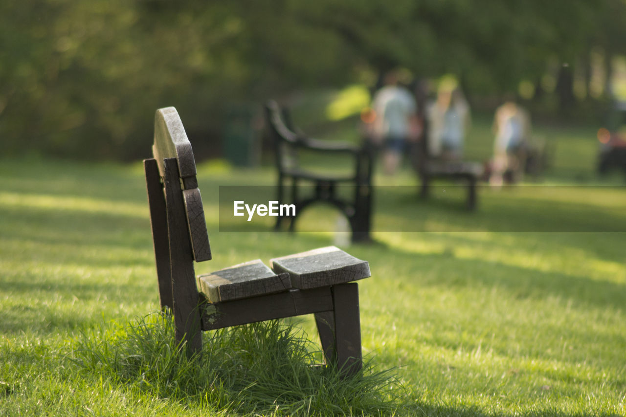 Empty bench in park