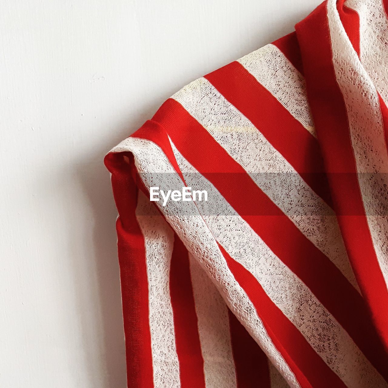 Close-up of american flag against white background